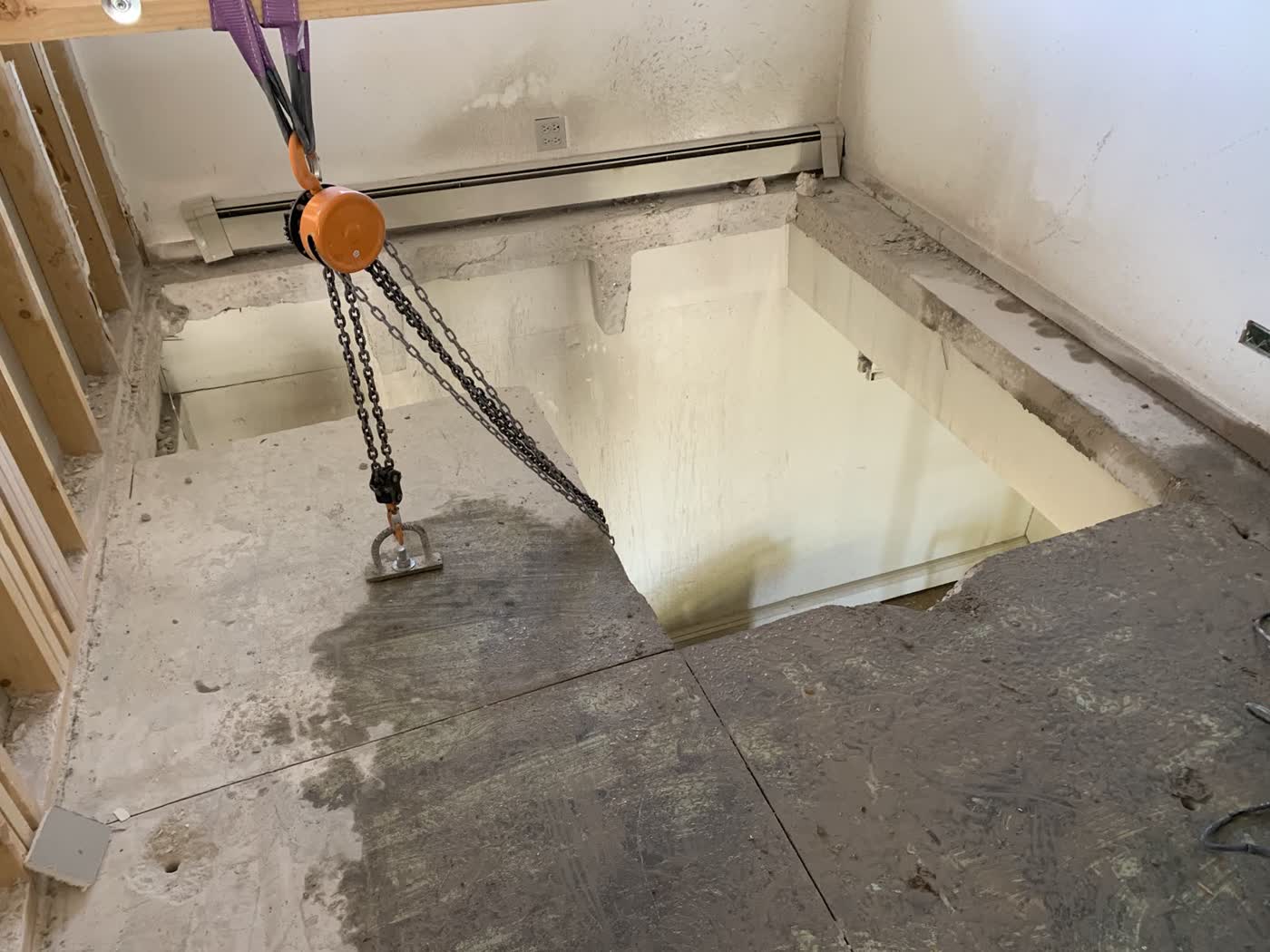 Slab opened and lifted with a chain hoist