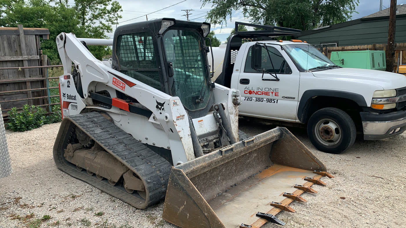 All in One truck and track loader at a job